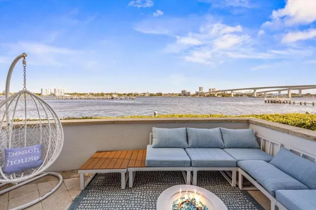 a view of a dining room with furniture and window