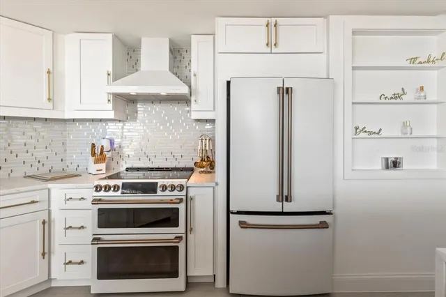 a bedroom with bed and a couch