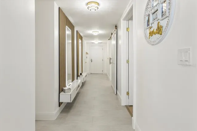 a view of a tall building next to a big yard