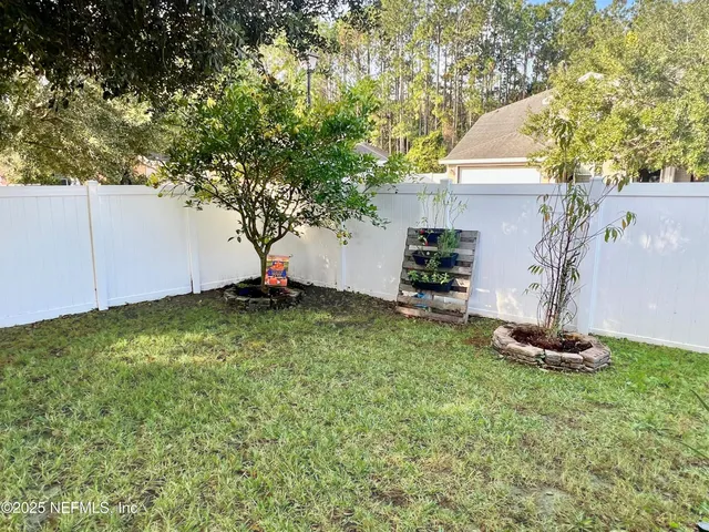 a fire hydrant in the middle of a field