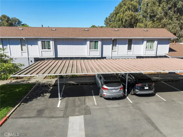 a car parked in front of a house