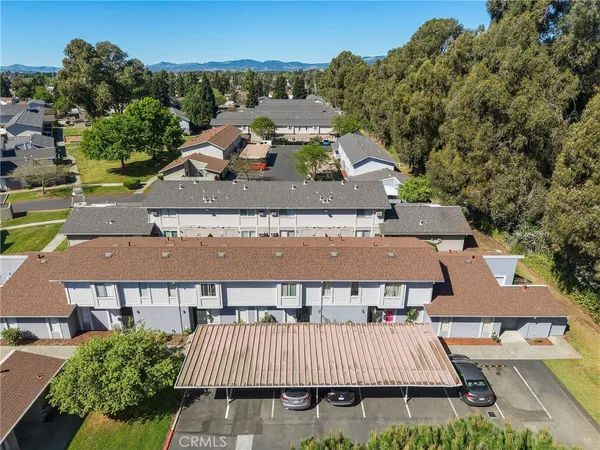 an aerial view of a house with roof deck