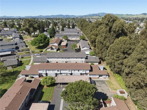 an aerial view of a house with a garden