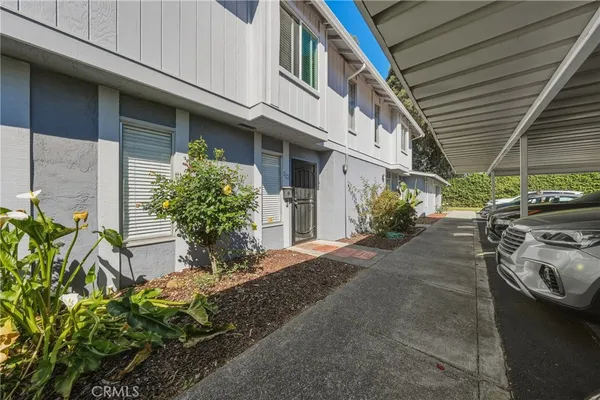 a yellow house with outdoor space
