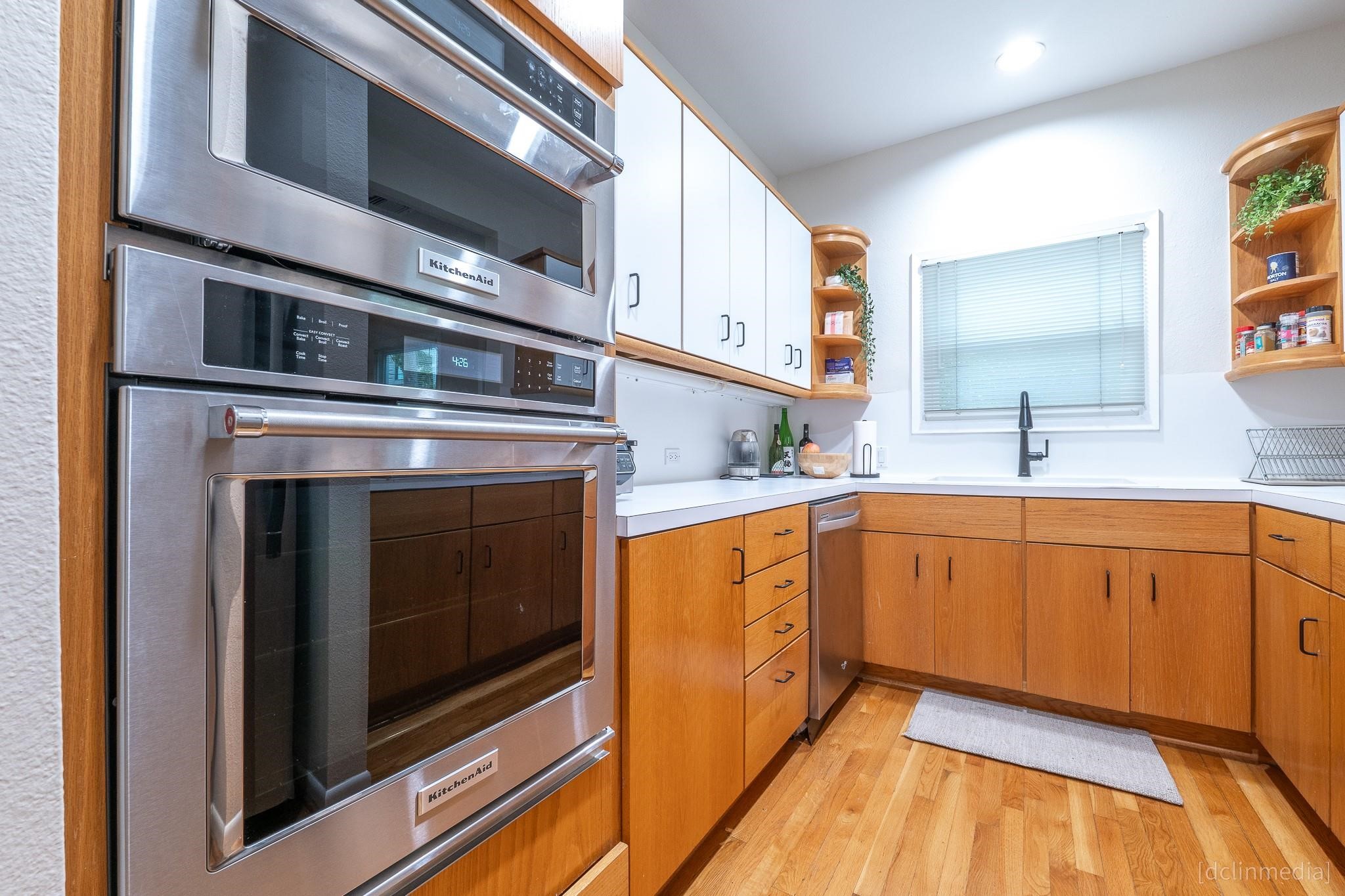 2002 Norfolk Street, Unit A Houston, TX 77098 - Photo 11 of 35 a kitchen with stainless steel appliances granite countertop a stove and a sink