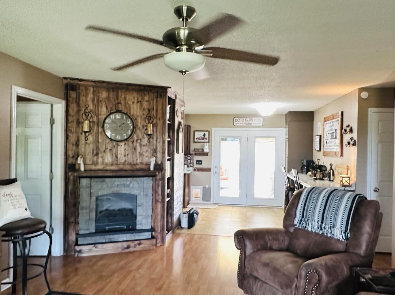 1753 Vales Mill Road Pulaski, TN 38478 - Photo 9 of 14 a living room with furniture a large window and a fireplace