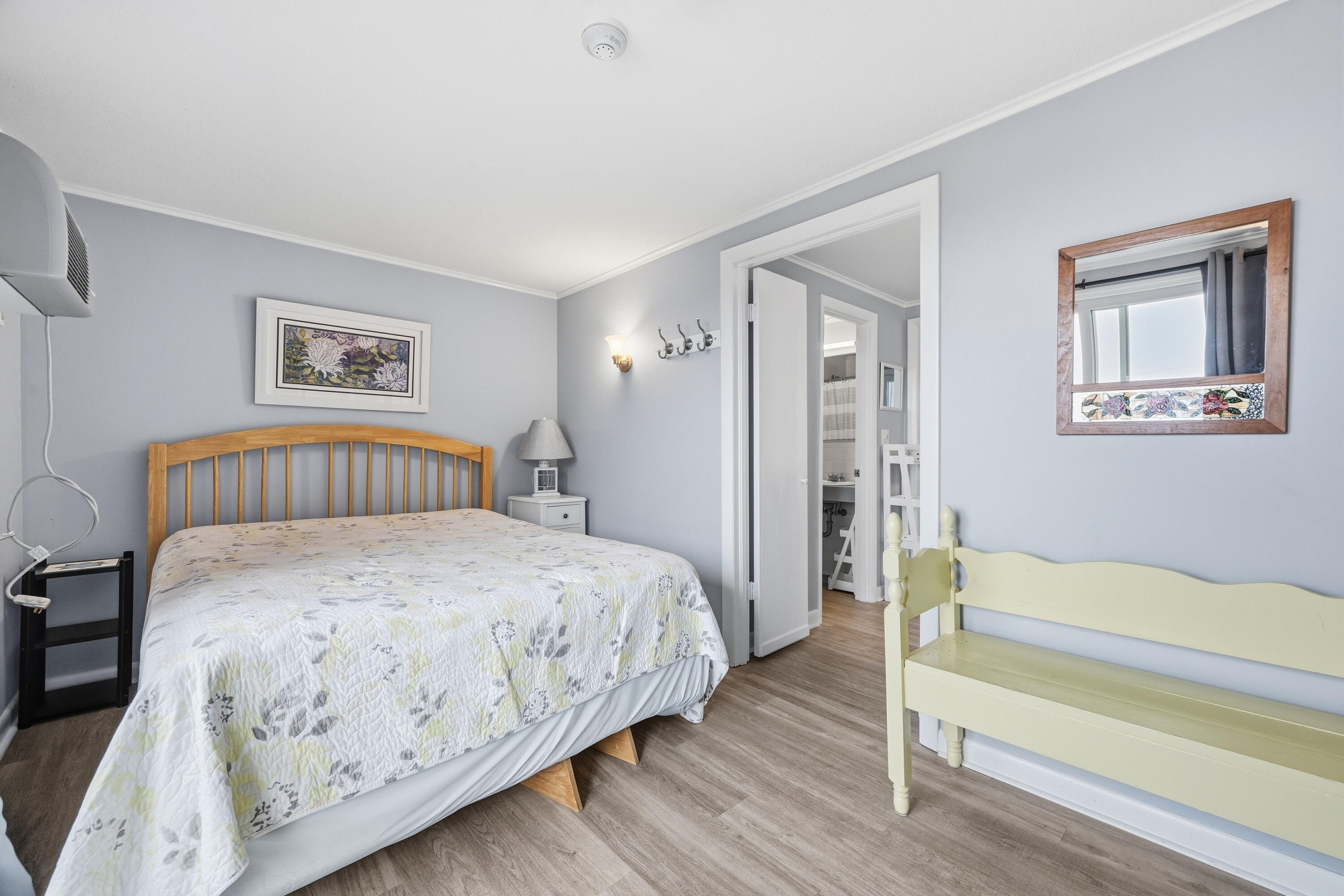 154 Old Wharf Road, Unit 51 Dennis Port, MA 02639 - Photo 5 of 12 a bedroom with a bed and a walk in closet
