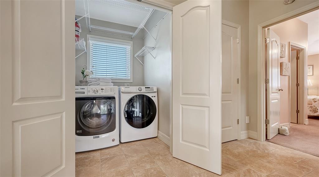 220 36th Street Holmes Beach, FL 34217 - Photo 23 of 59 a utility room with sink dryer and washer