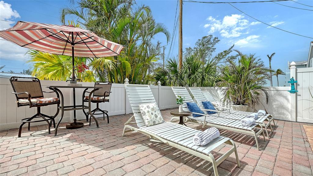 220 36th Street Holmes Beach, FL 34217 - Photo 33 of 59 a view of outdoor space yard and patio