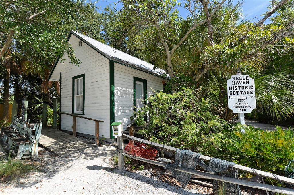 220 36th Street Holmes Beach, FL 34217 - Photo 59 of 59 a view of a house with a yard and sitting area