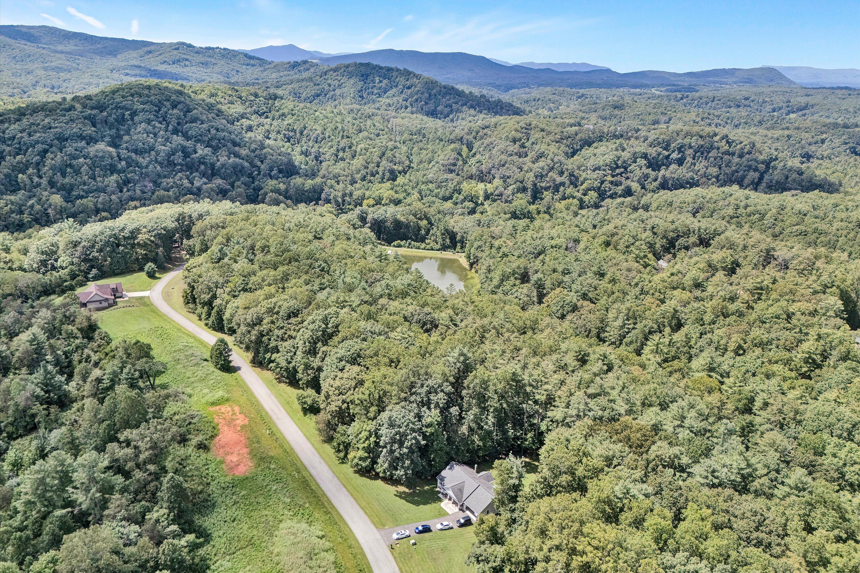 Lot 6 River Rock Road Vinton, VA 24179 - Photo 7 of 10 a view of a lush green hillside and a mountain