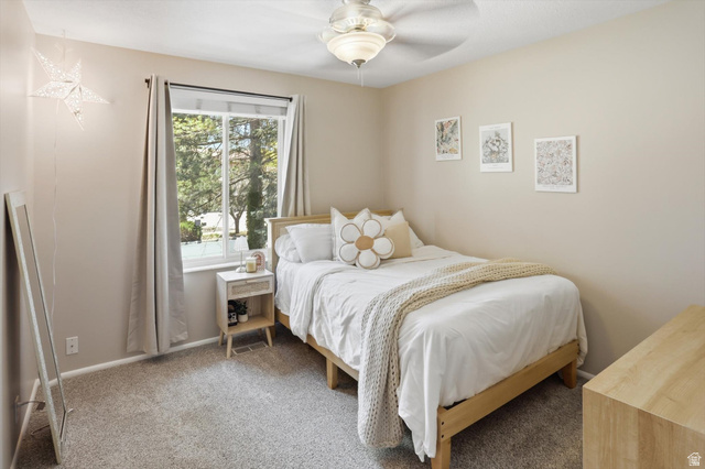 8938 Manchester Lane Sandy, UT 84093 - Photo 18 of 50 Light beige painted walls and a textured gray carpet define this room