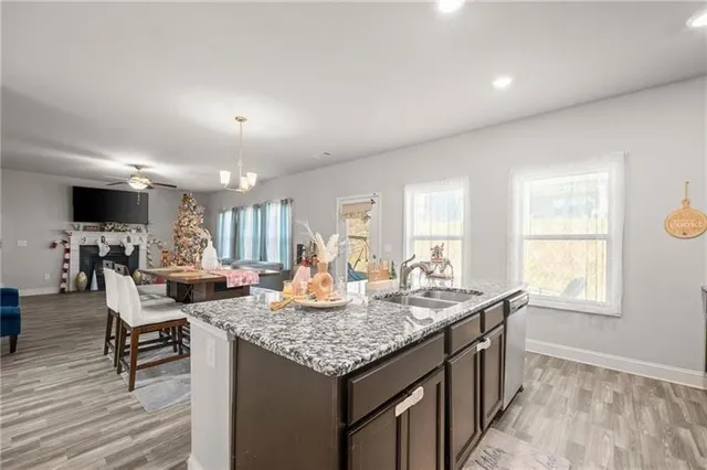 a living room with granite countertop furniture and a table