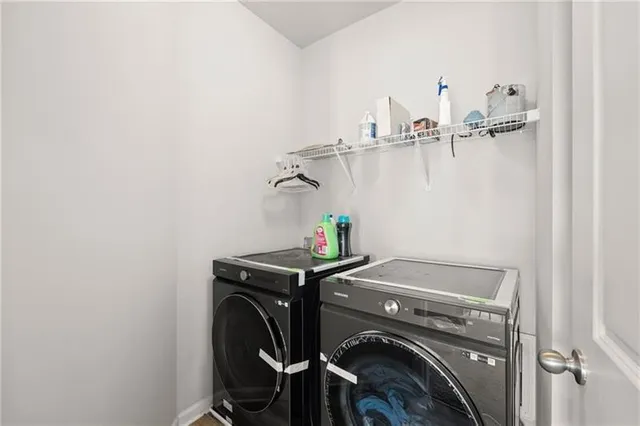 a utility room with dryer and washer