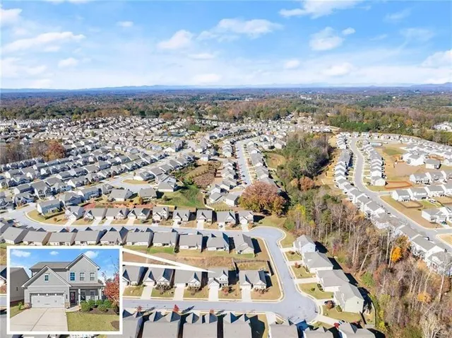 an aerial view of residential building with parking space