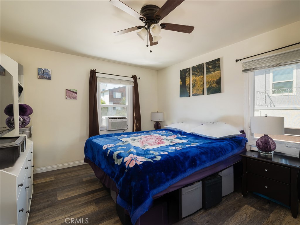 7019 Ramsgate Avenue Los Angeles, CA 90045 - Photo 12 of 19 a bedroom with a bed and a window