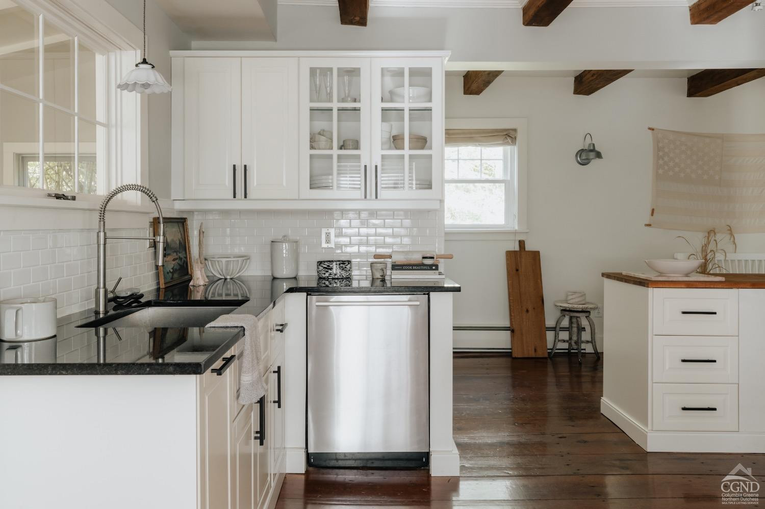 367 County Rt 2 Marbletown, NY 12404 - Photo 18 of 43 a kitchen with granite countertop a sink appliances cabinets and counter space