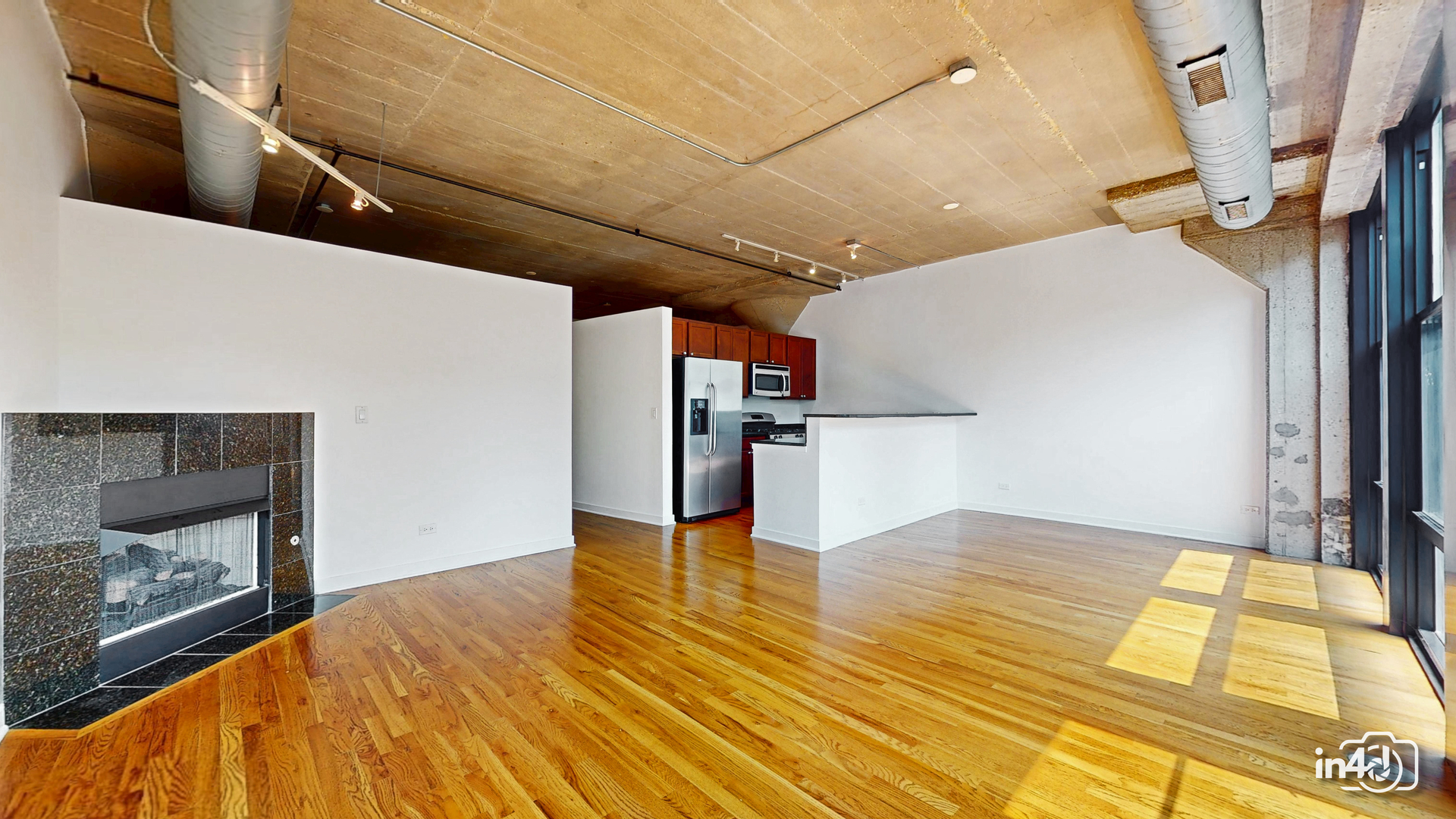1150 West 15th Street, Unit 232 Chicago, IL 60608 - Photo 11 of 33 a view of empty room with wooden floor