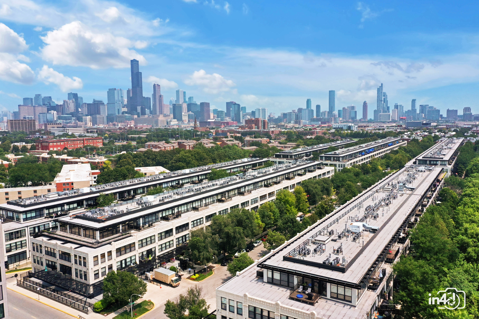 1150 West 15th Street, Unit 232 Chicago, IL 60608 - Photo 2 of 33 a city view with tall buildings