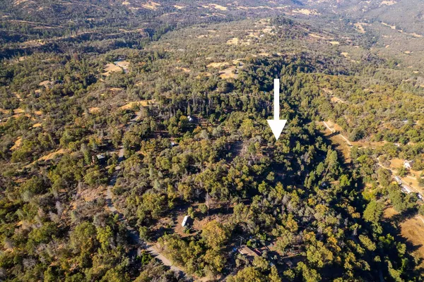 a view of residential houses with city view
