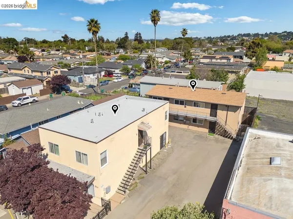 an aerial view of a house with a garden
