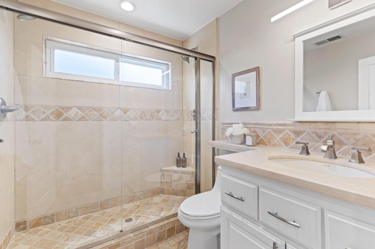 1426 Walnut Drive Campbell, CA 95008 - Photo 11 of 52 a bathroom with a granite countertop sink a toilet and shower