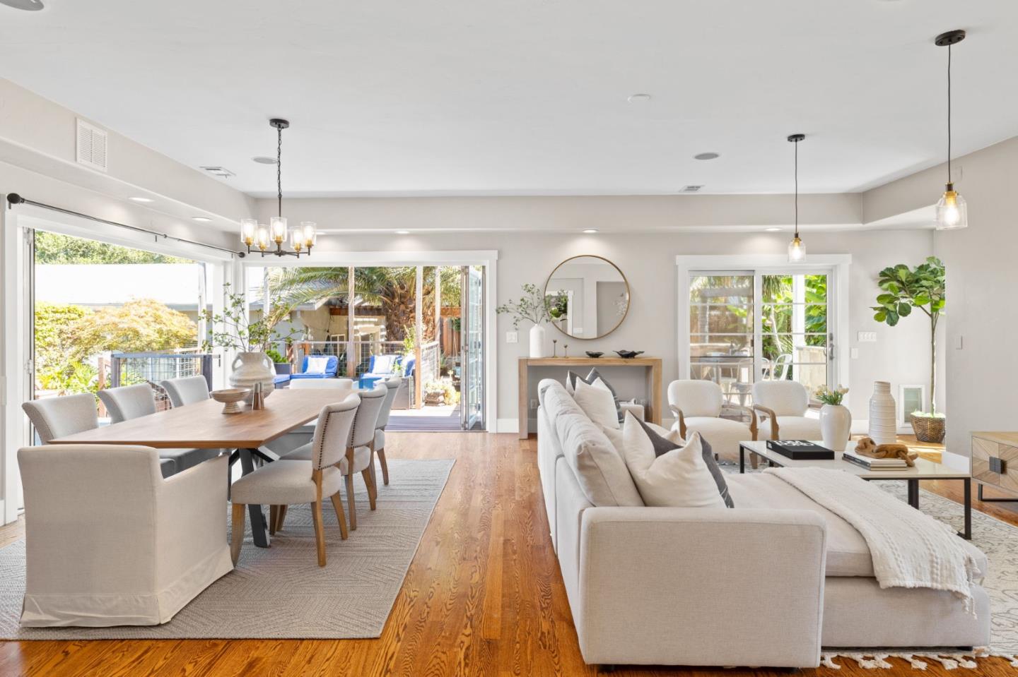 1426 Walnut Drive Campbell, CA 95008 - Photo 16 of 52 a living room with furniture a chandelier and a large window