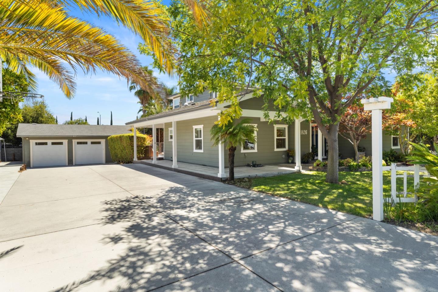 1426 Walnut Drive Campbell, CA 95008 - Photo 2 of 52 a front view of a house with a garden