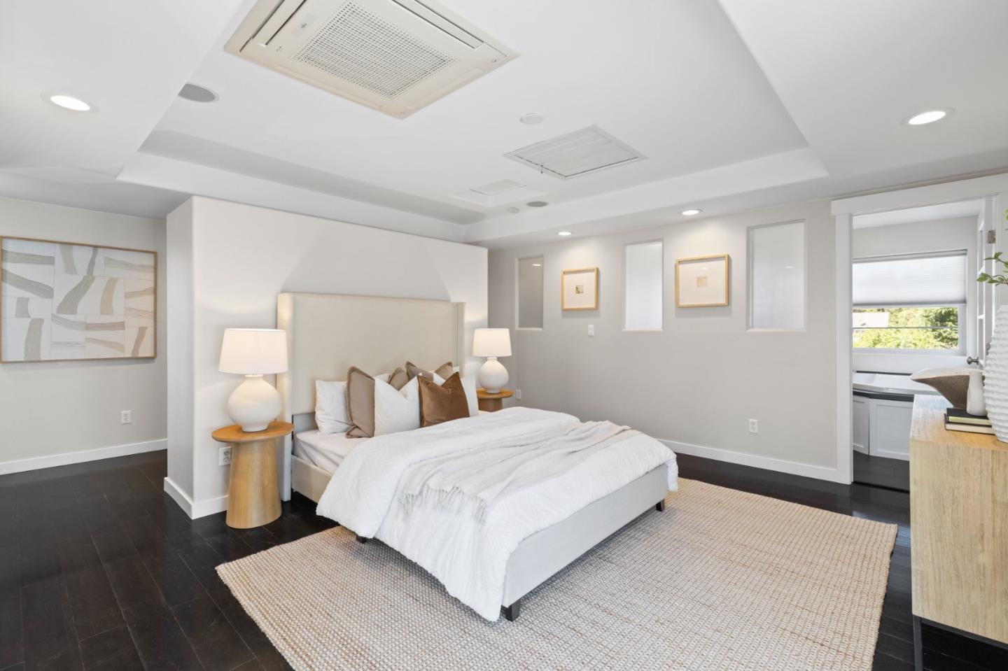 1426 Walnut Drive Campbell, CA 95008 - Photo 22 of 52 a bedroom with a large bed and a table