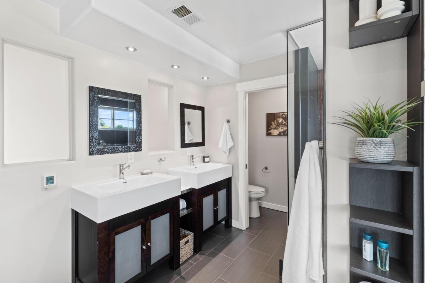 1426 Walnut Drive Campbell, CA 95008 - Photo 24 of 52 a bathroom with a sink and a mirror