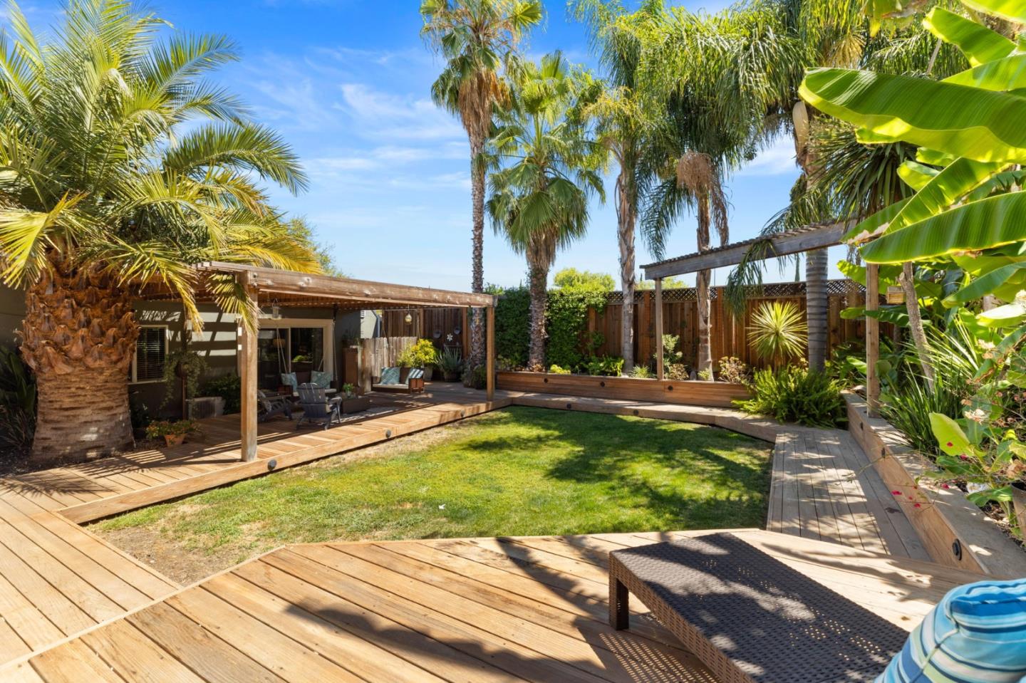 1426 Walnut Drive Campbell, CA 95008 - Photo 33 of 52 a view of a patio with table and chairs and potted plants