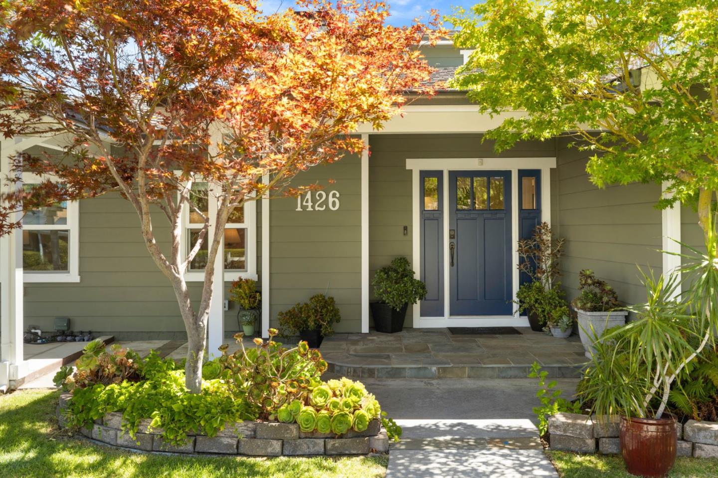 1426 Walnut Drive Campbell, CA 95008 - Photo 4 of 52 a front view of a house with garden