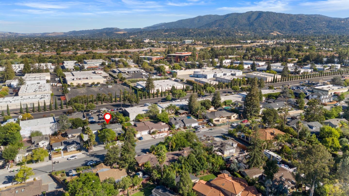 1426 Walnut Drive Campbell, CA 95008 - Photo 42 of 52 an aerial view of a city with lots of residential buildings and mountain view in back