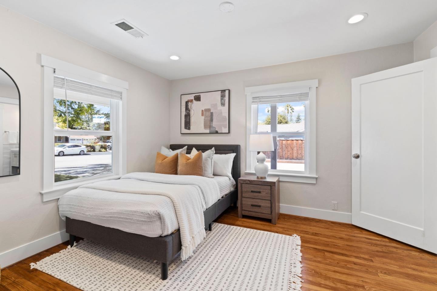 1426 Walnut Drive Campbell, CA 95008 - Photo 8 of 52 a bedroom with a bed wooden floor and window