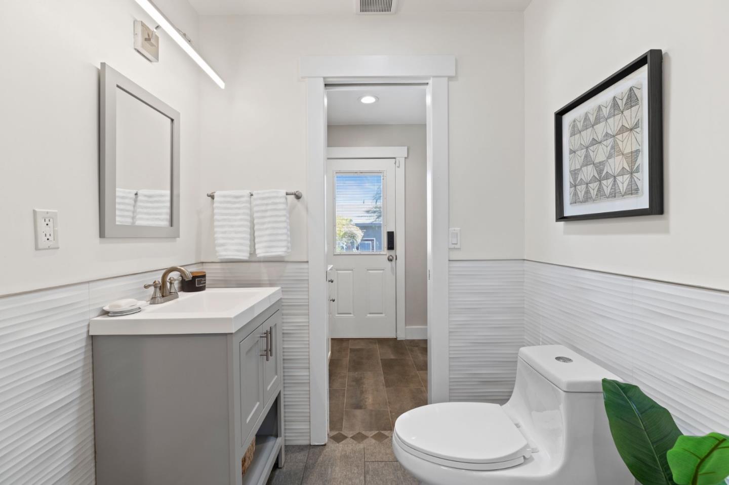 1426 Walnut Drive Campbell, CA 95008 - Photo 9 of 52 a bathroom with a sink mirror and toilet