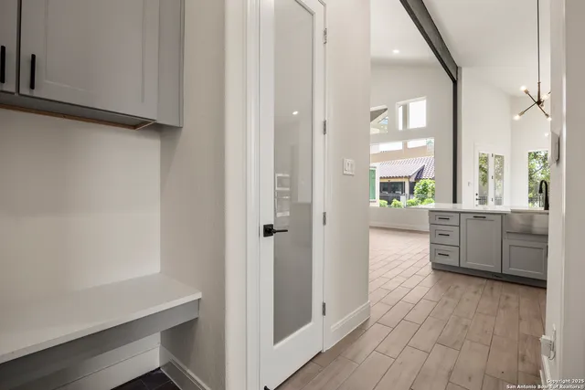 a view of a kitchen from the hallway