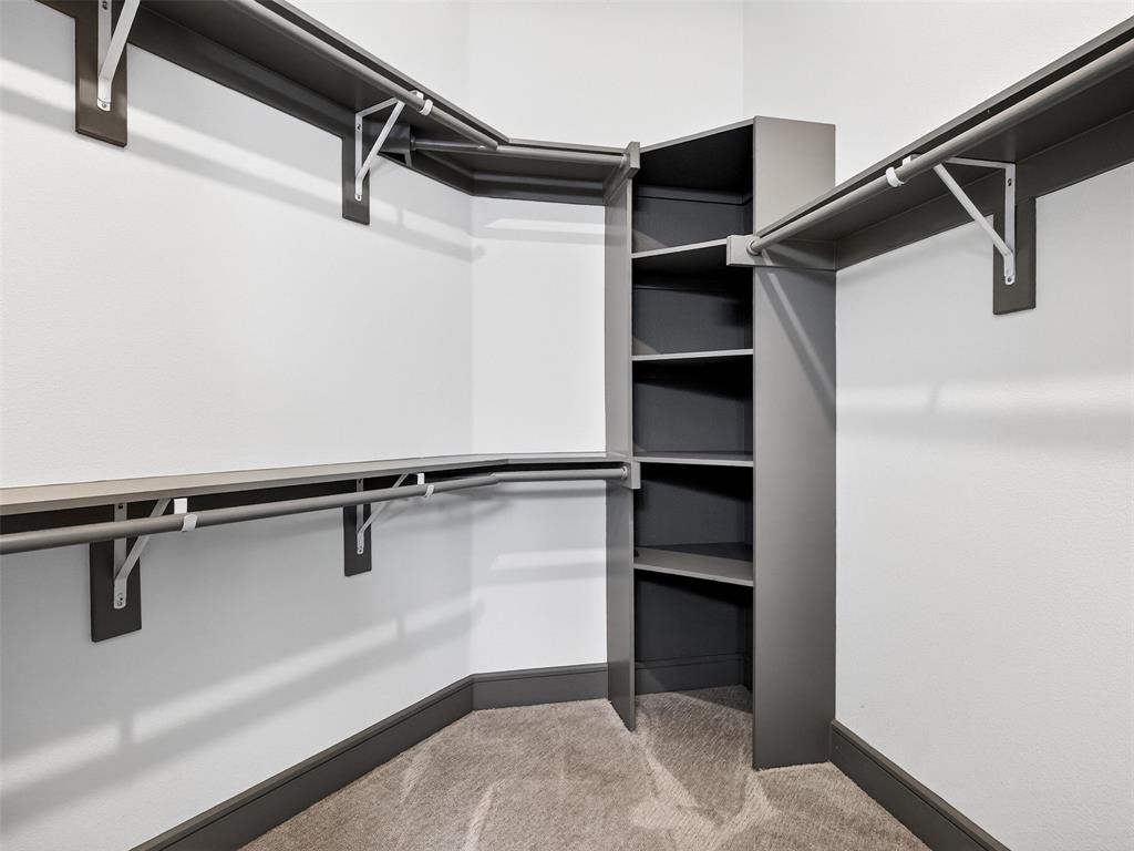 2700 Old Denton Road, Unit 3370 Carrollton, TX 75007 - Photo 22 of 35 a view of a room with shelf