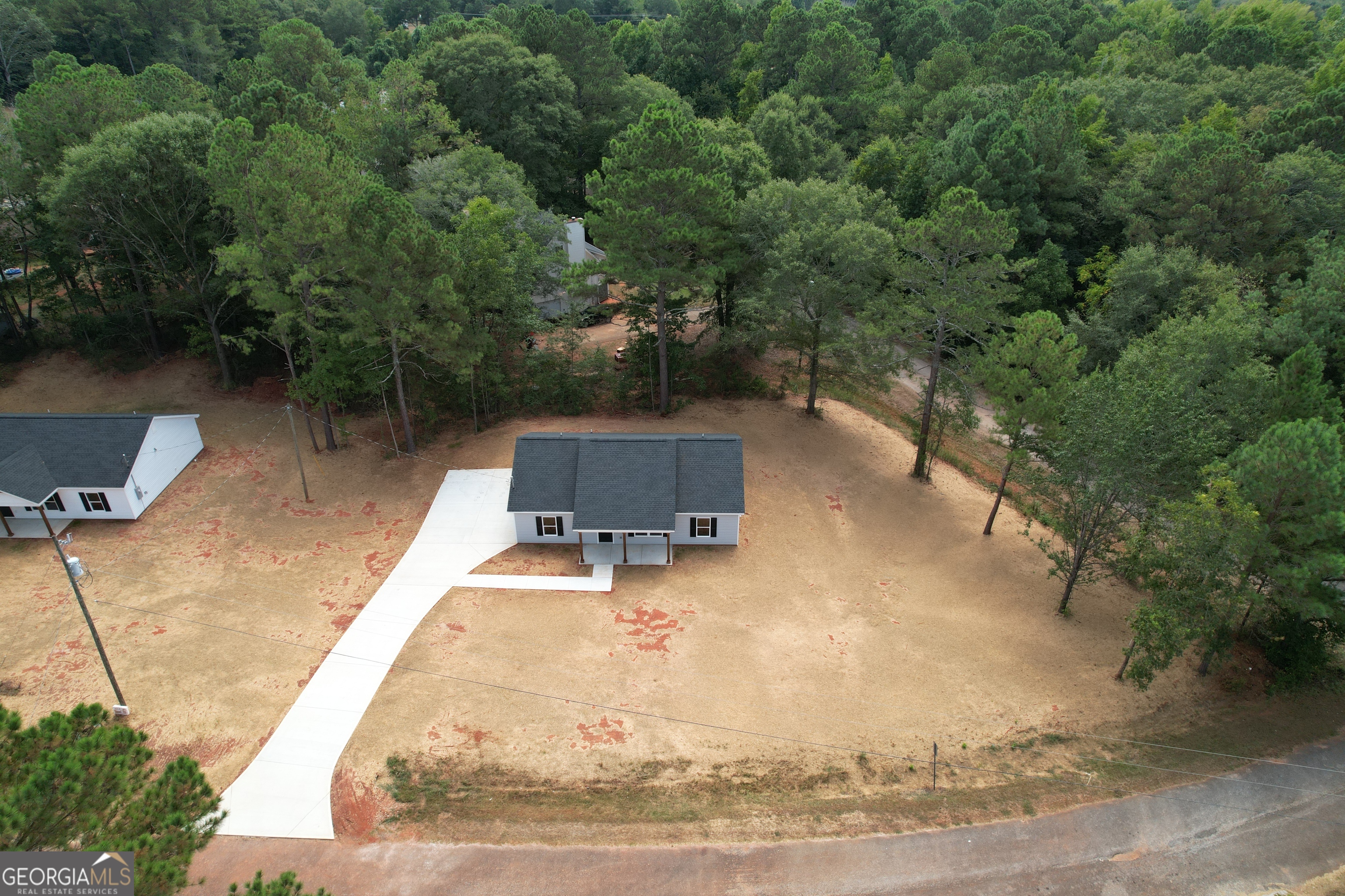 101 Alexandria Way Thomaston, GA 30286 - Photo 32 of 39 a view of a swimming pool with a yard