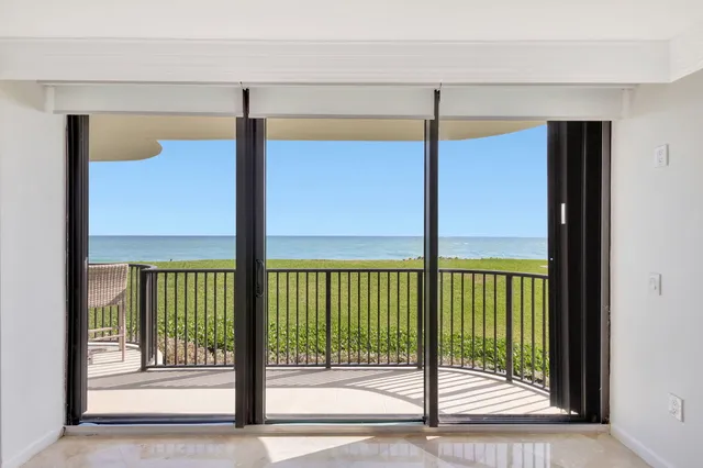 a view of balcony with furniture