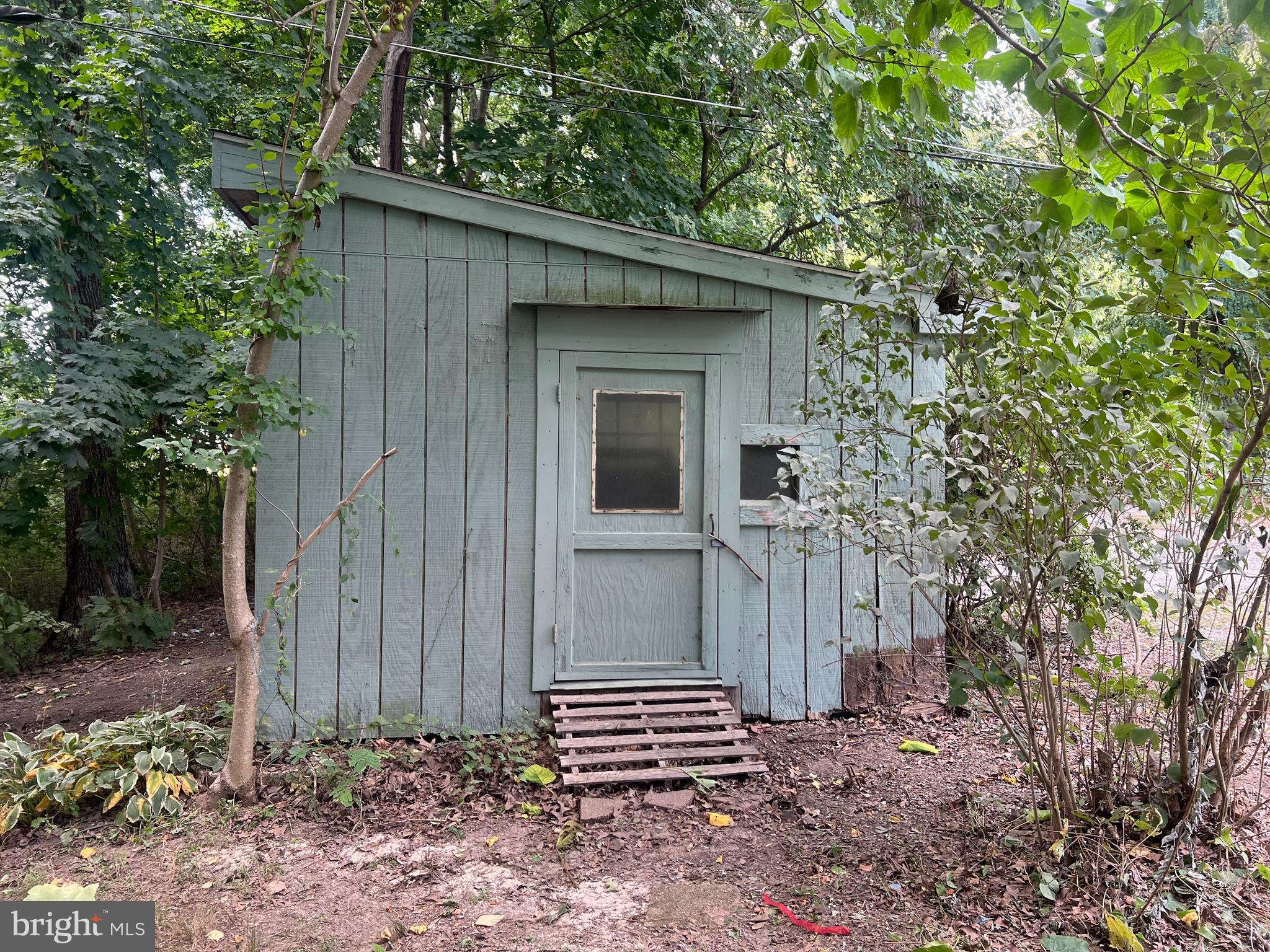 1 Punte Lane Essex, MD 21221 - Photo 11 of 37 a front view of a house with a garden