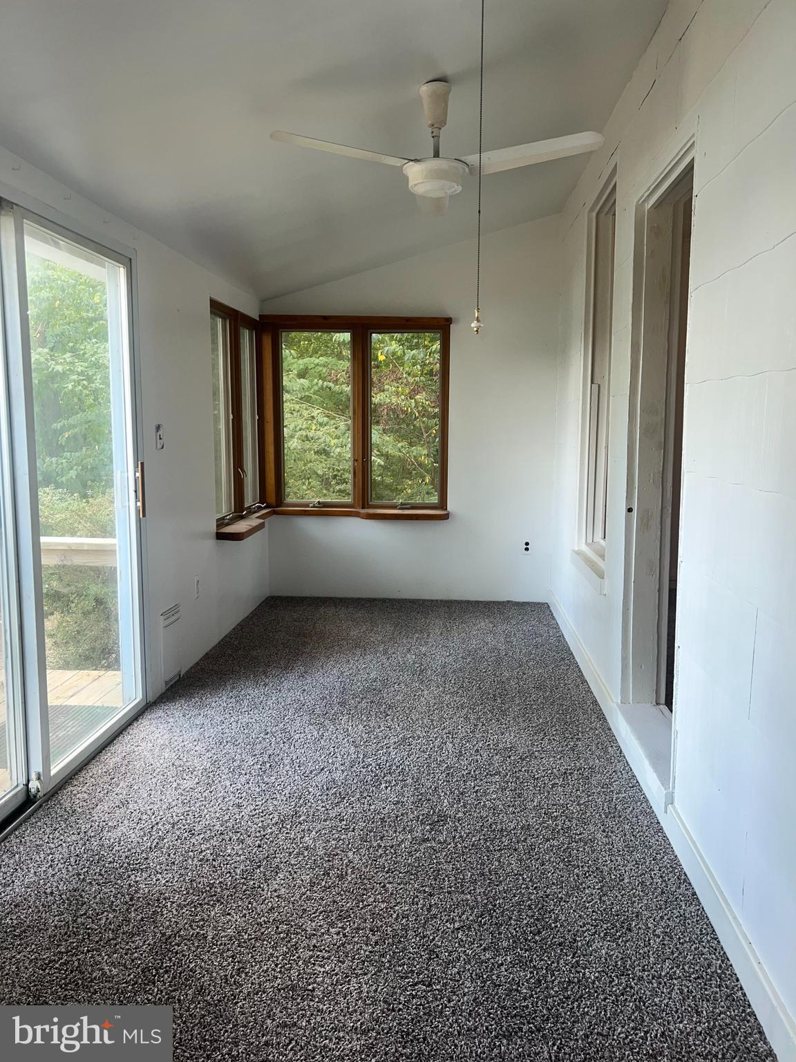 1 Punte Lane Essex, MD 21221 - Photo 20 of 37 an empty room with windows and closet