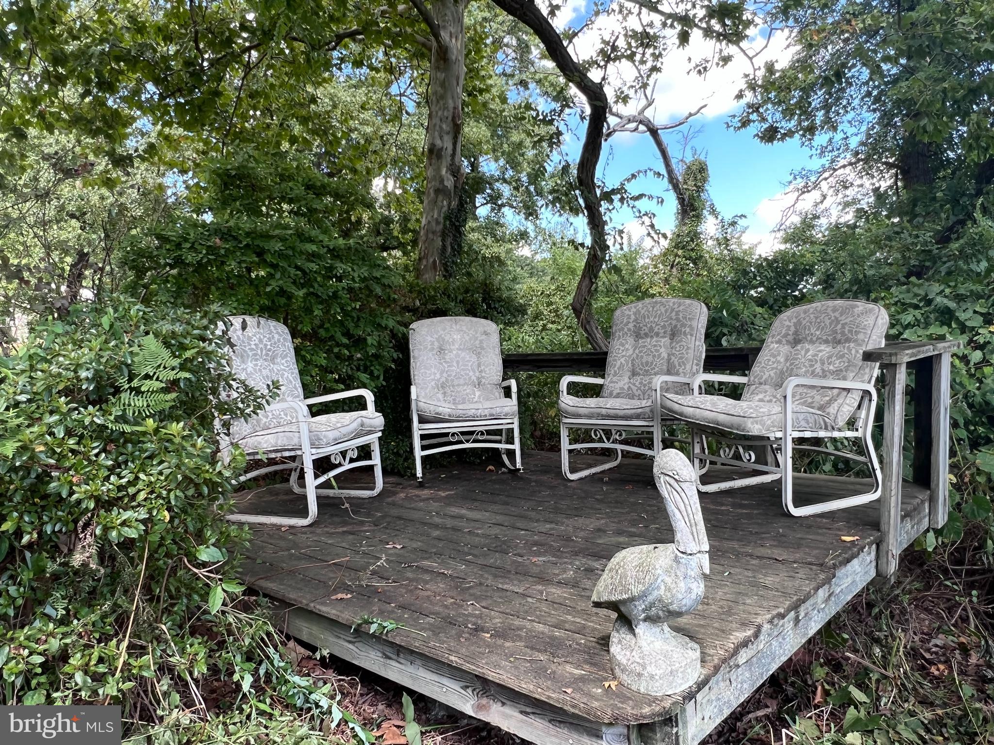 1 Punte Lane Essex, MD 21221 - Photo 2 of 37 a view of a tables and chairs in the patio