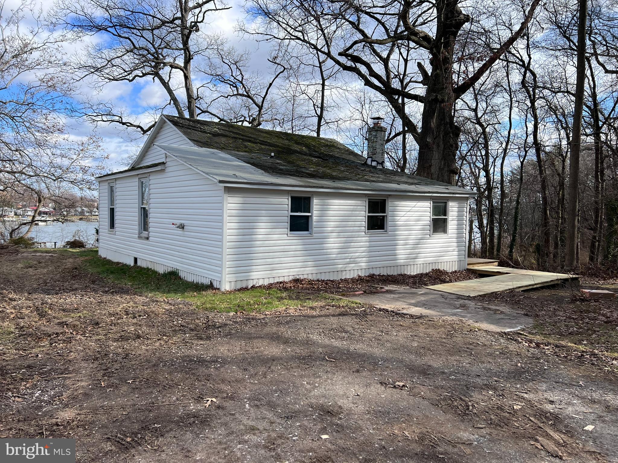 1 Punte Lane Essex, MD 21221 - Photo 29 of 37 a view of a house with a yard