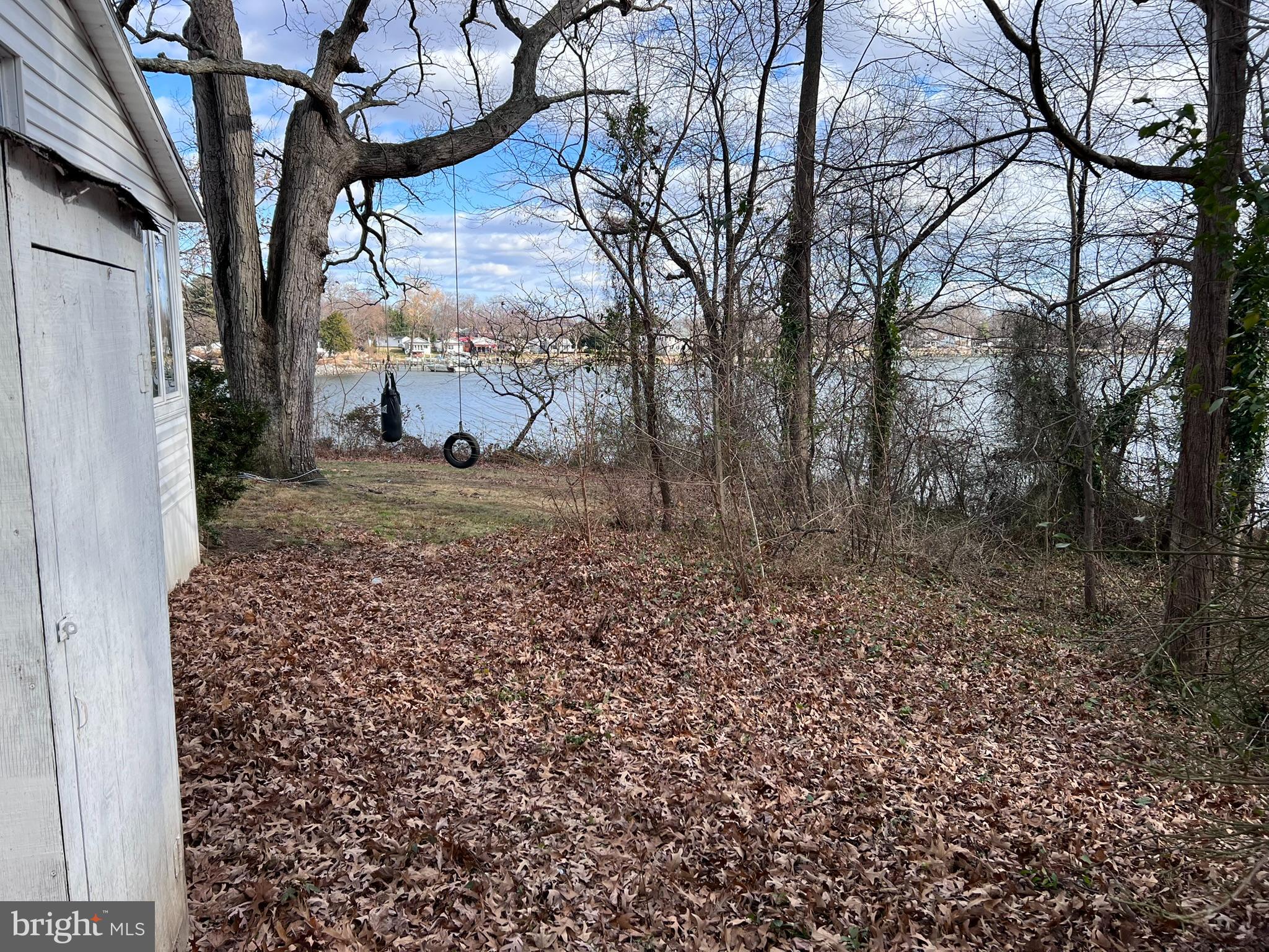 1 Punte Lane Essex, MD 21221 - Photo 32 of 37 a view of a yard with large trees