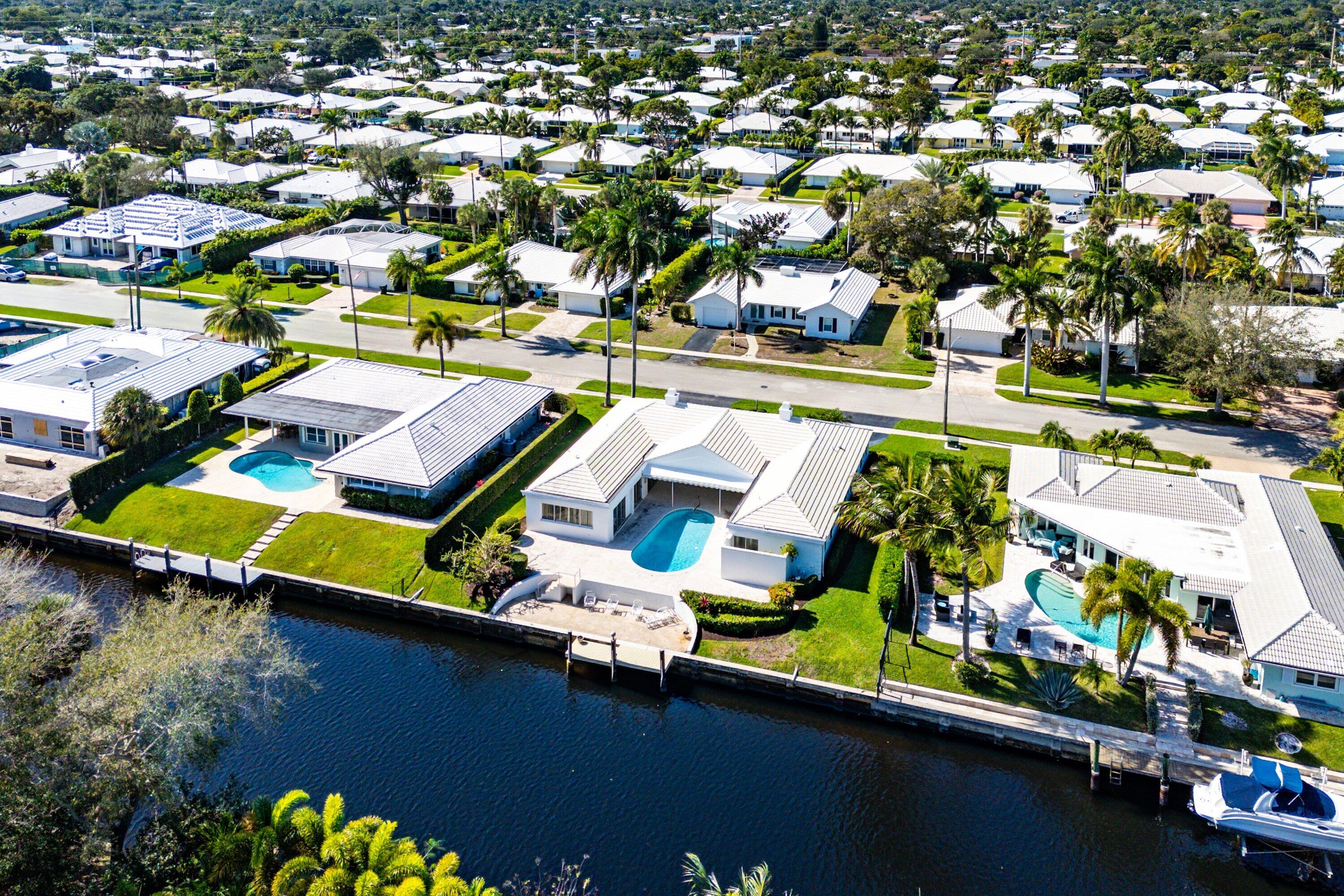 950 Mulberry Way Boca Raton, FL 33486 - Photo 2 of 23 an aerial view of a house with a lake view