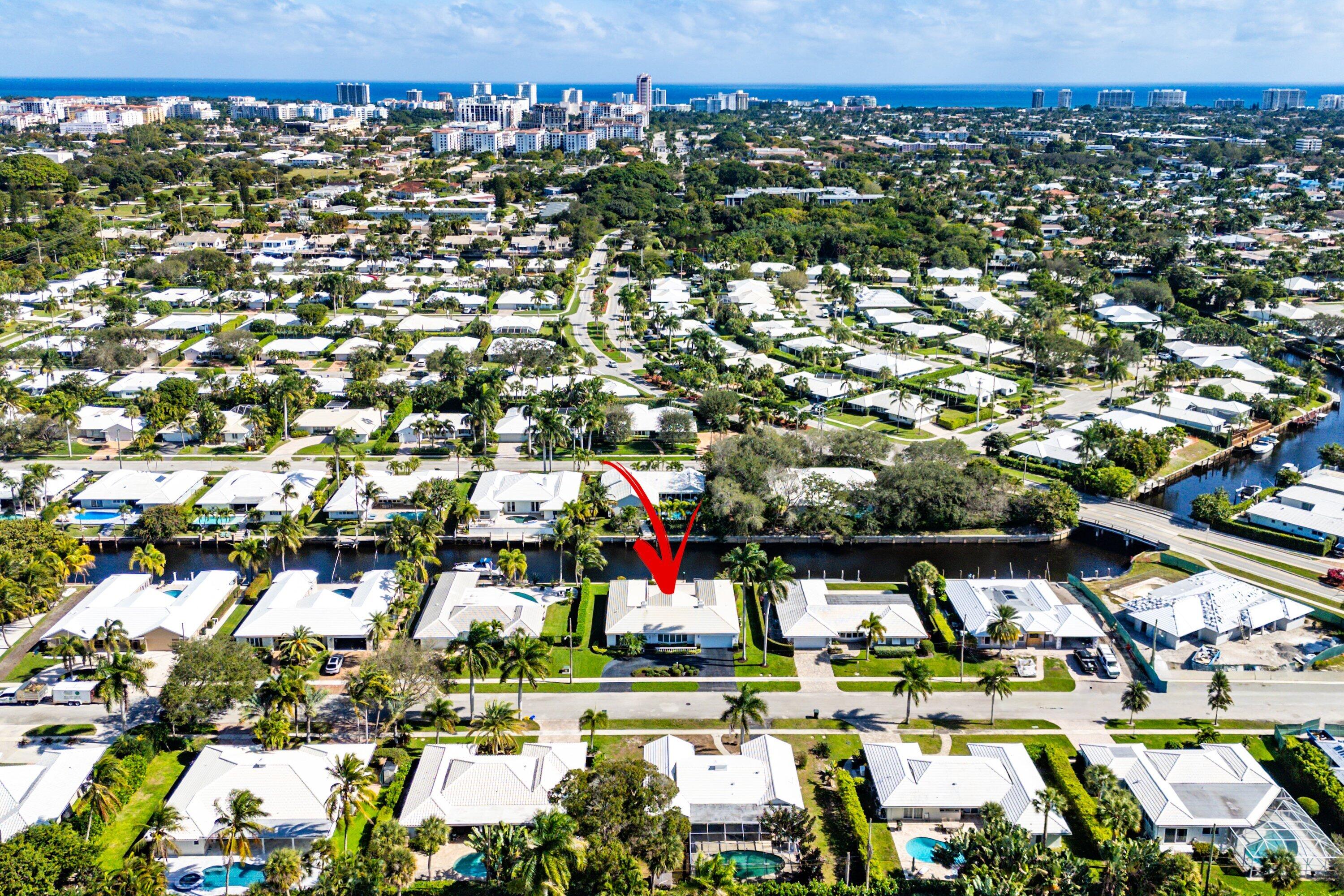 950 Mulberry Way Boca Raton, FL 33486 - Photo 3 of 23 an aerial view of residential houses with outdoor space and trees