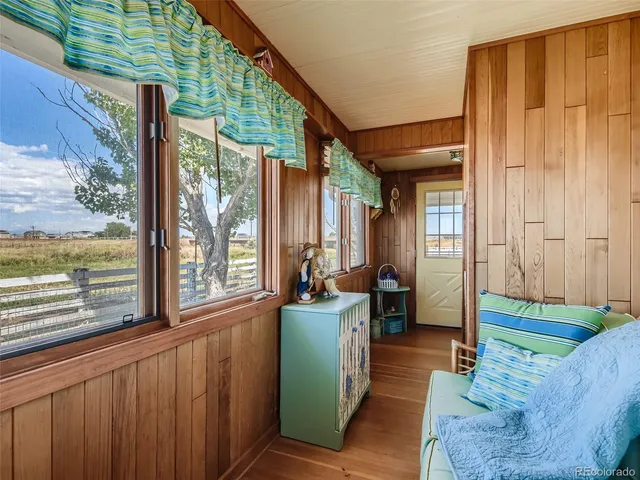 a storage room with a stove and a refrigerator