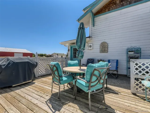 a view of a terrace with seating space