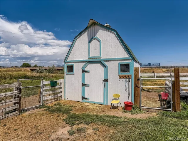 a view of backyard of house