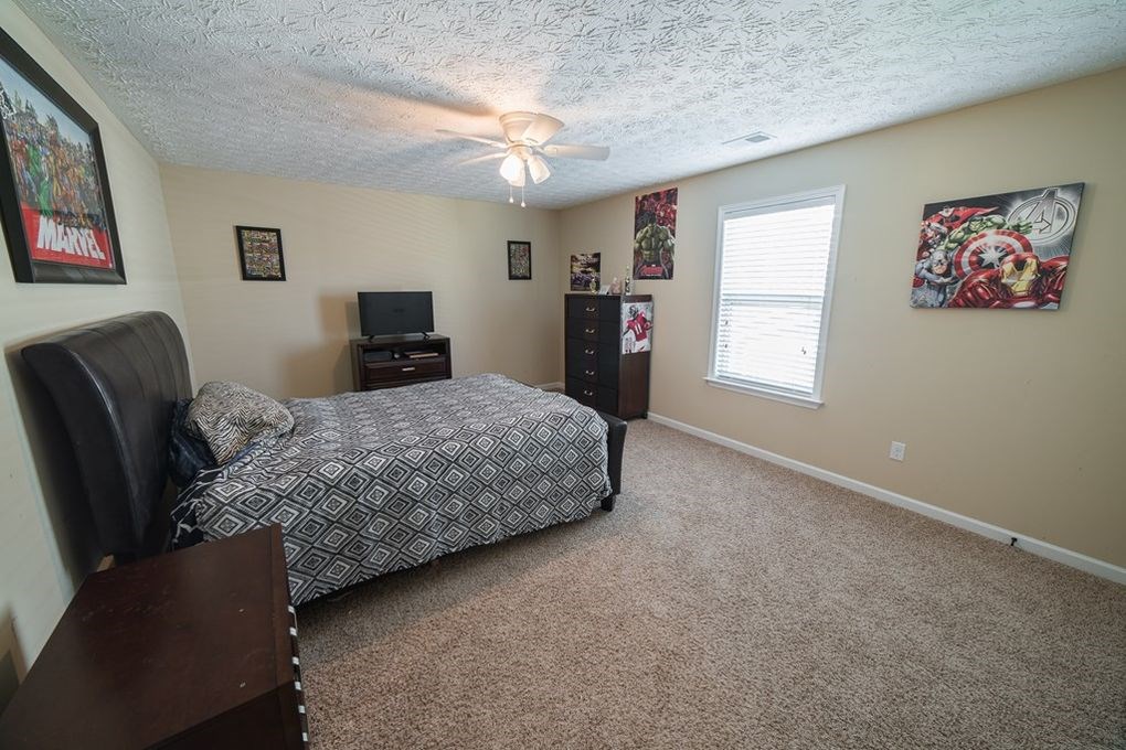 9570 Yarbrough Road Midland, GA 31820 - Photo 18 of 30 a living room with furniture and a window